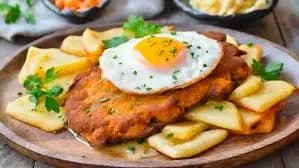 Milanesa a Caballo C/Guarnicion