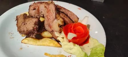 Porción Punta de Espalda a las Llamas c/ Guarnición